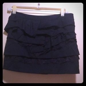 Black ruffled mini skirt